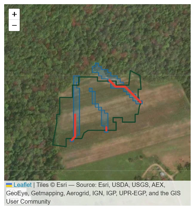 TerrainLogic satellite view showing three terrain-derived concentrated-flow corridors, the field boundary, and upstream contributing paths